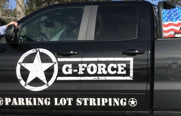 g-force founder jack child standing in front of truck
